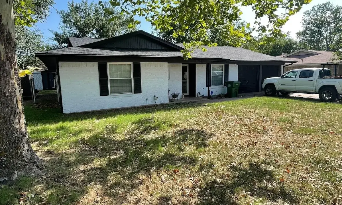 Professional roofing crew working on a residential roof in Ladson